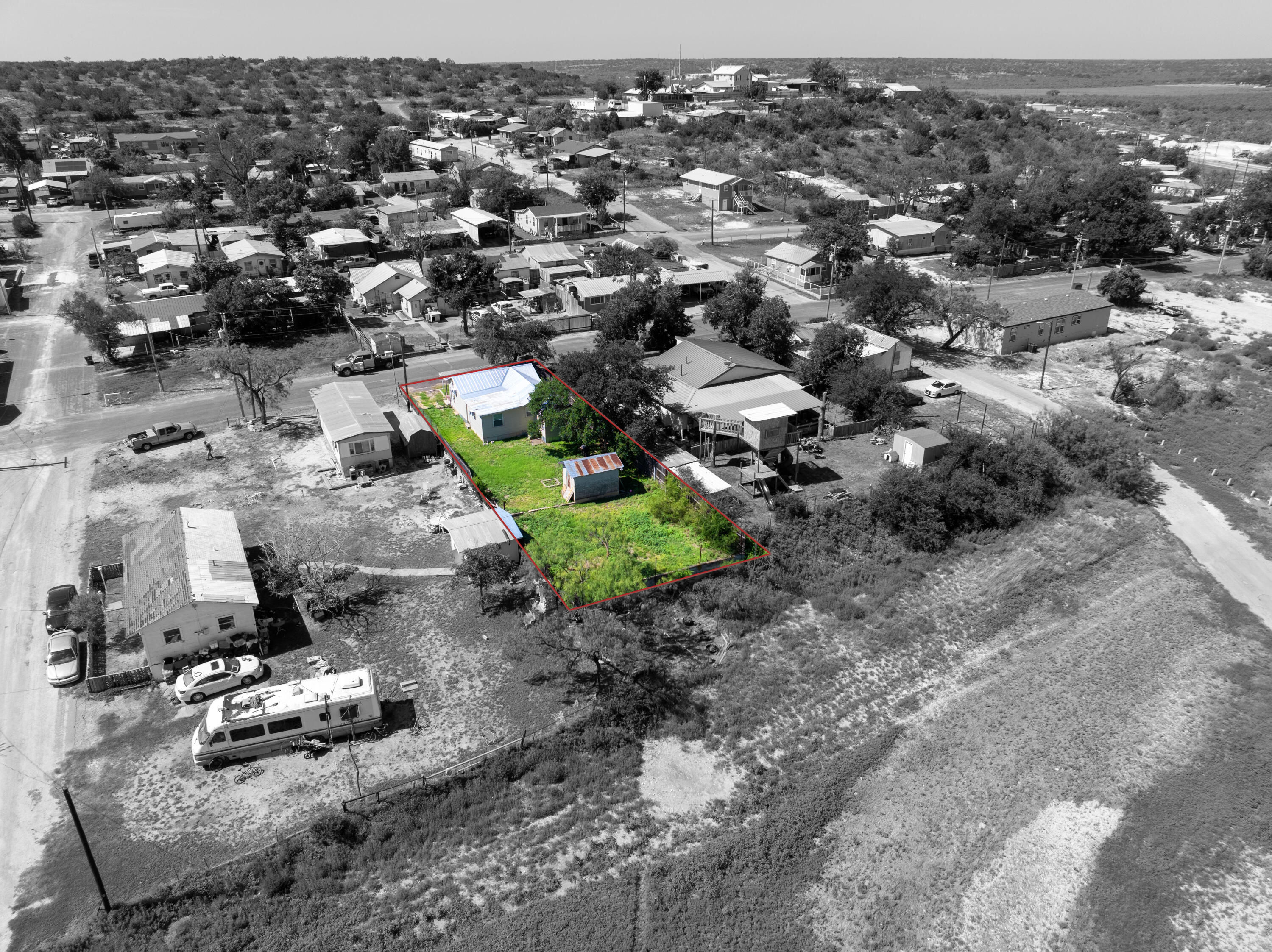 2006 Santa Rosa Street Ozona, TX 76943 - Photo 14 of 14 2006 Santa Rosa rear with red and satura
