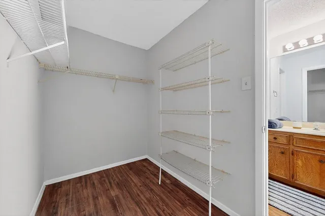 a bathroom with a shower and a toilet