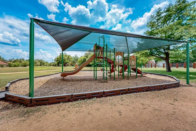a view of a swimming pool with lounge chair