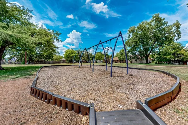 a view of a yard with an trees