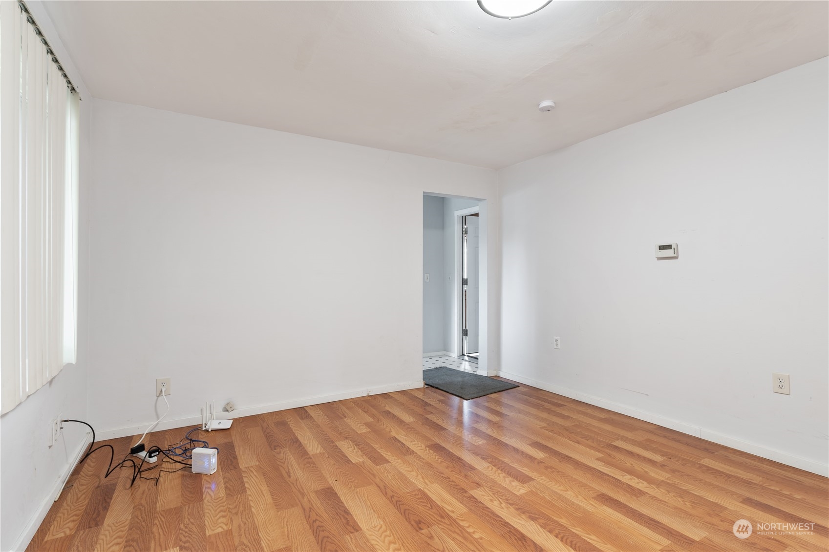 11632 24th Avenue South Seattle, WA 98168 - Photo 2 of 38 a view of empty room with wooden floor