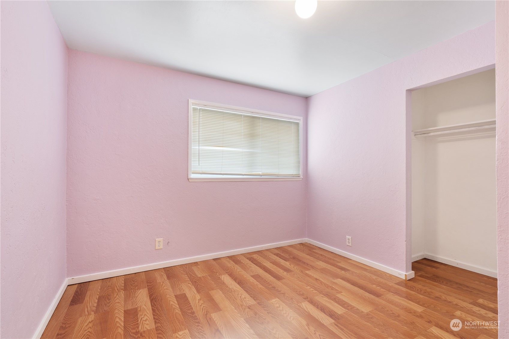 11632 24th Avenue South Seattle, WA 98168 - Photo 25 of 38 a view of an empty room with wooden floor and a window