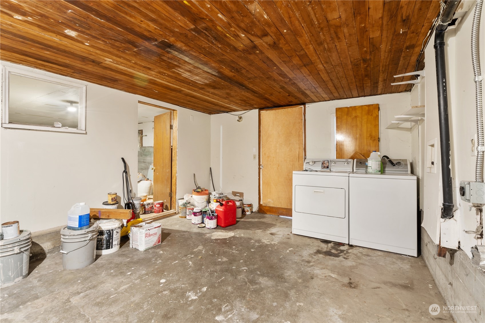 11632 24th Avenue South Seattle, WA 98168 - Photo 34 of 38 a room with furniture and white walls