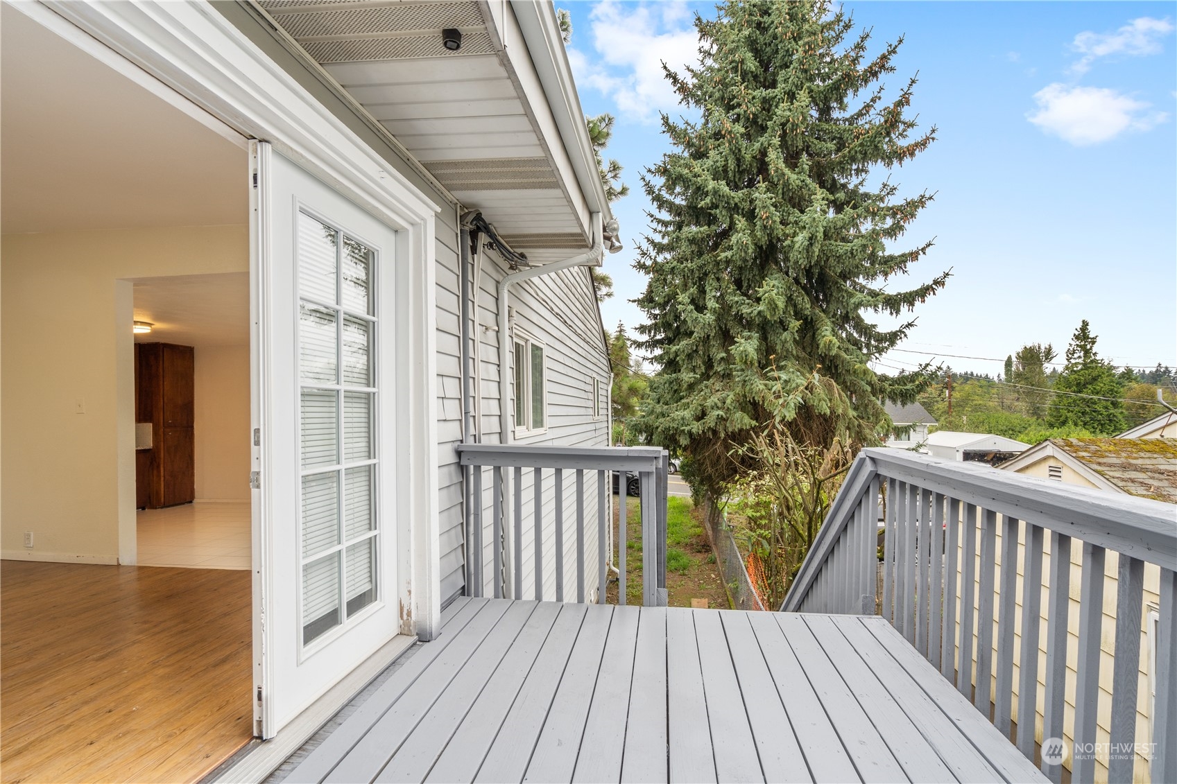 11632 24th Avenue South Seattle, WA 98168 - Photo 9 of 38 a view of balcony with wooden floor and fence