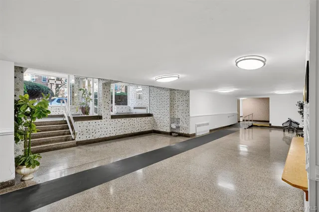 a view of a living room and hardwood floor