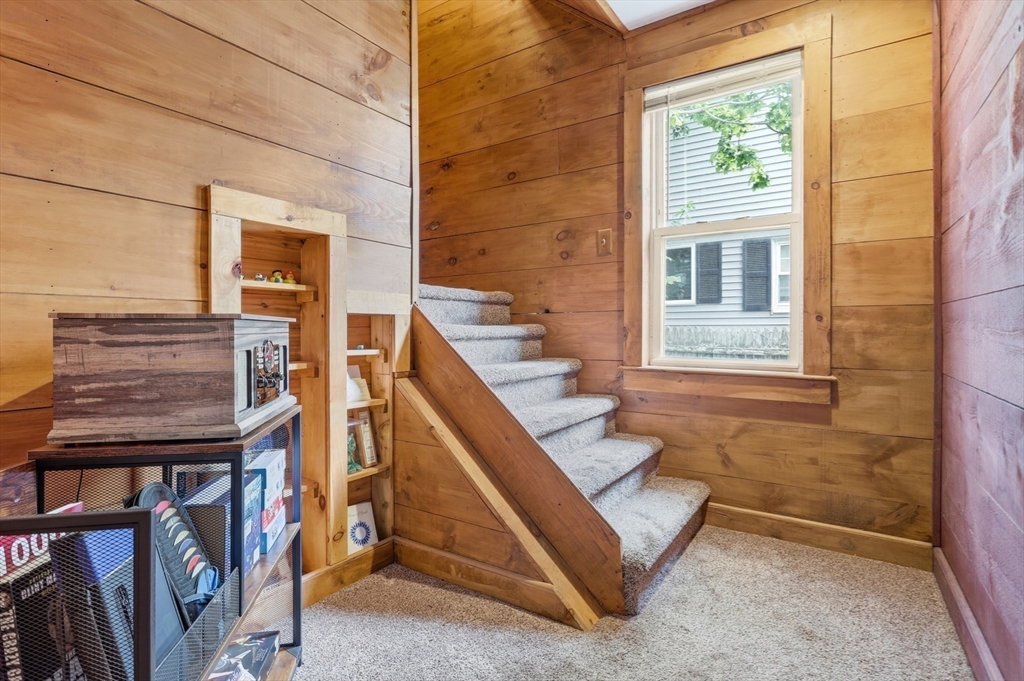 2 Cashman Road Peabody, MA 01960 - Photo 7 of 37 a view of an entryway with wooden floor and windows