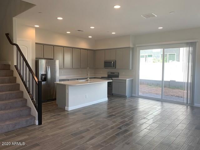 4329 East Berkeley Road Phoenix, AZ 85008 - Photo 3 of 19 Quinn kitchen great room 3a
