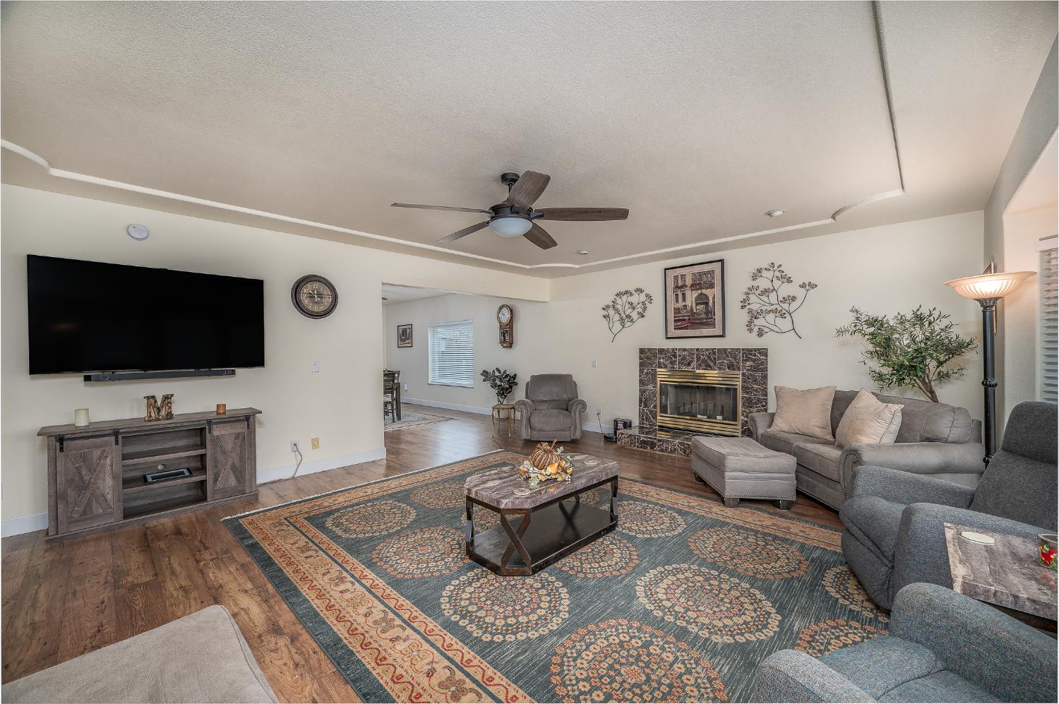 1850 Hammond Drive Turlock, CA 95382 - Photo 14 of 57 a living room with furniture and a flat screen tv