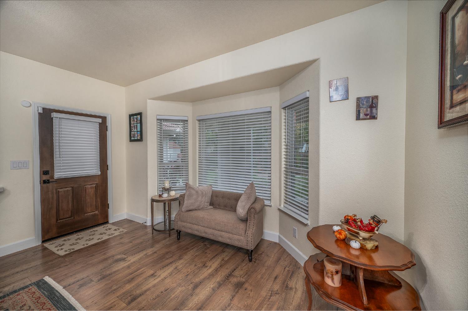 1850 Hammond Drive Turlock, CA 95382 - Photo 23 of 57 a living room with furniture and wooden floor