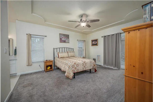 a bathroom with double vanity sinks and a mirror