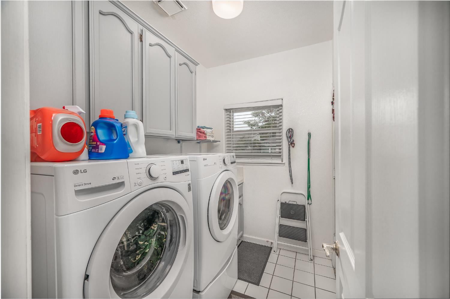 1850 Hammond Drive Turlock, CA 95382 - Photo 37 of 57 a view of storage and utility room with washer and dryer