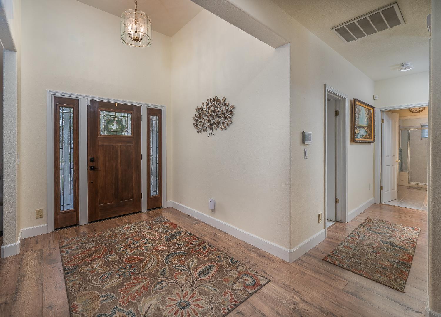 1850 Hammond Drive Turlock, CA 95382 - Photo 40 of 57 wooden floor in an empty room with a window