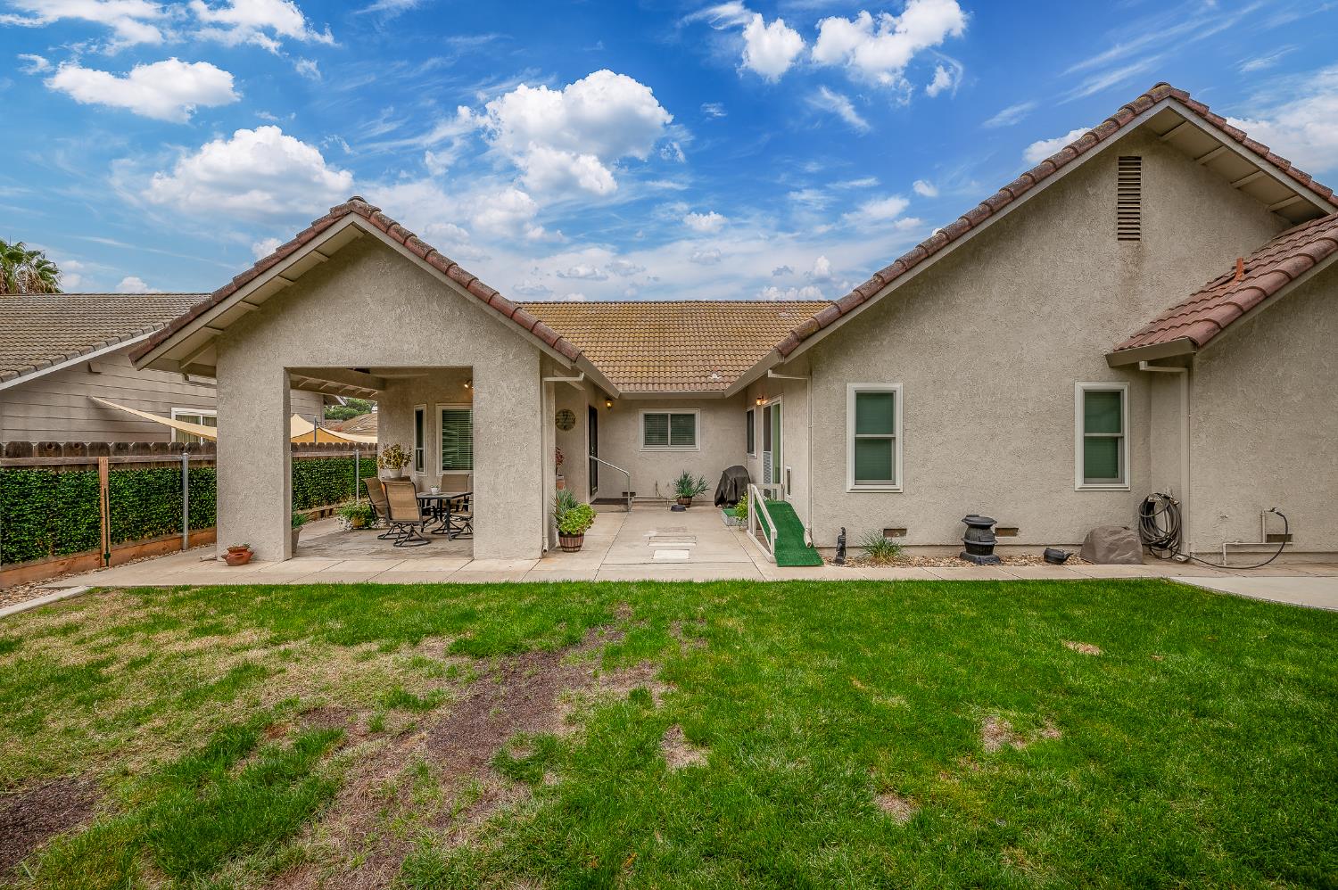 1850 Hammond Drive Turlock, CA 95382 - Photo 45 of 57 a front view of house with yard and outdoor seating