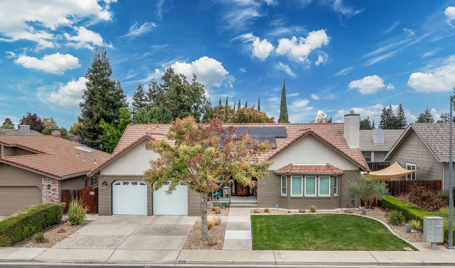 1850 Hammond Drive Turlock, CA 95382 - Photo 7 of 57 a front view of a house with garden