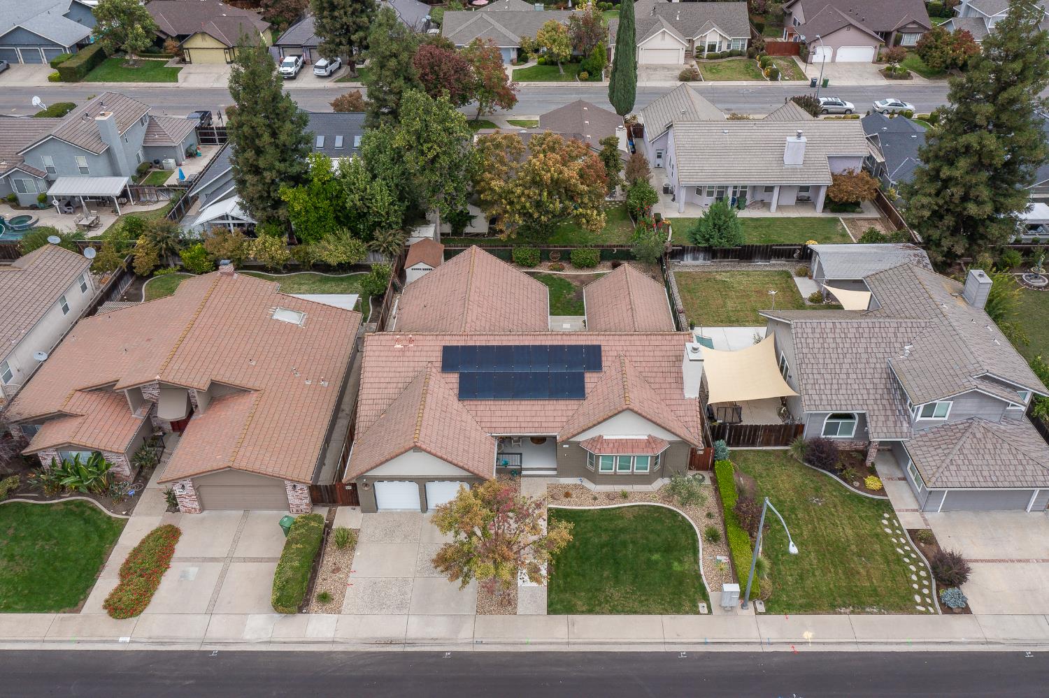 1850 Hammond Drive Turlock, CA 95382 - Photo 8 of 57 an aerial view of residential houses with outdoor space and parking