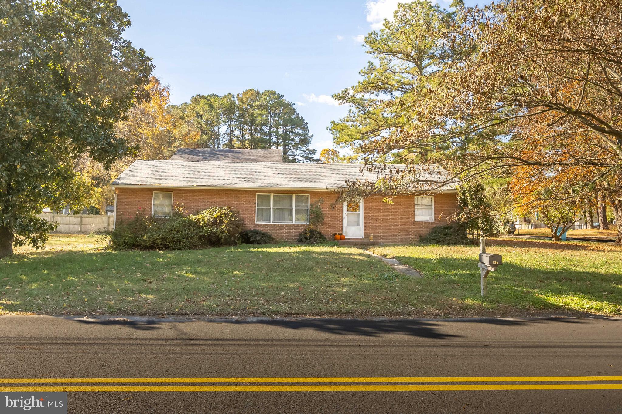 136 Marvel Road Salisbury, MD 21801 - Photo 1 of 42 Charming brick home with lush greenery.