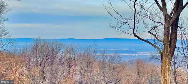 a living room with furniture or fireplace and a flat screen tv