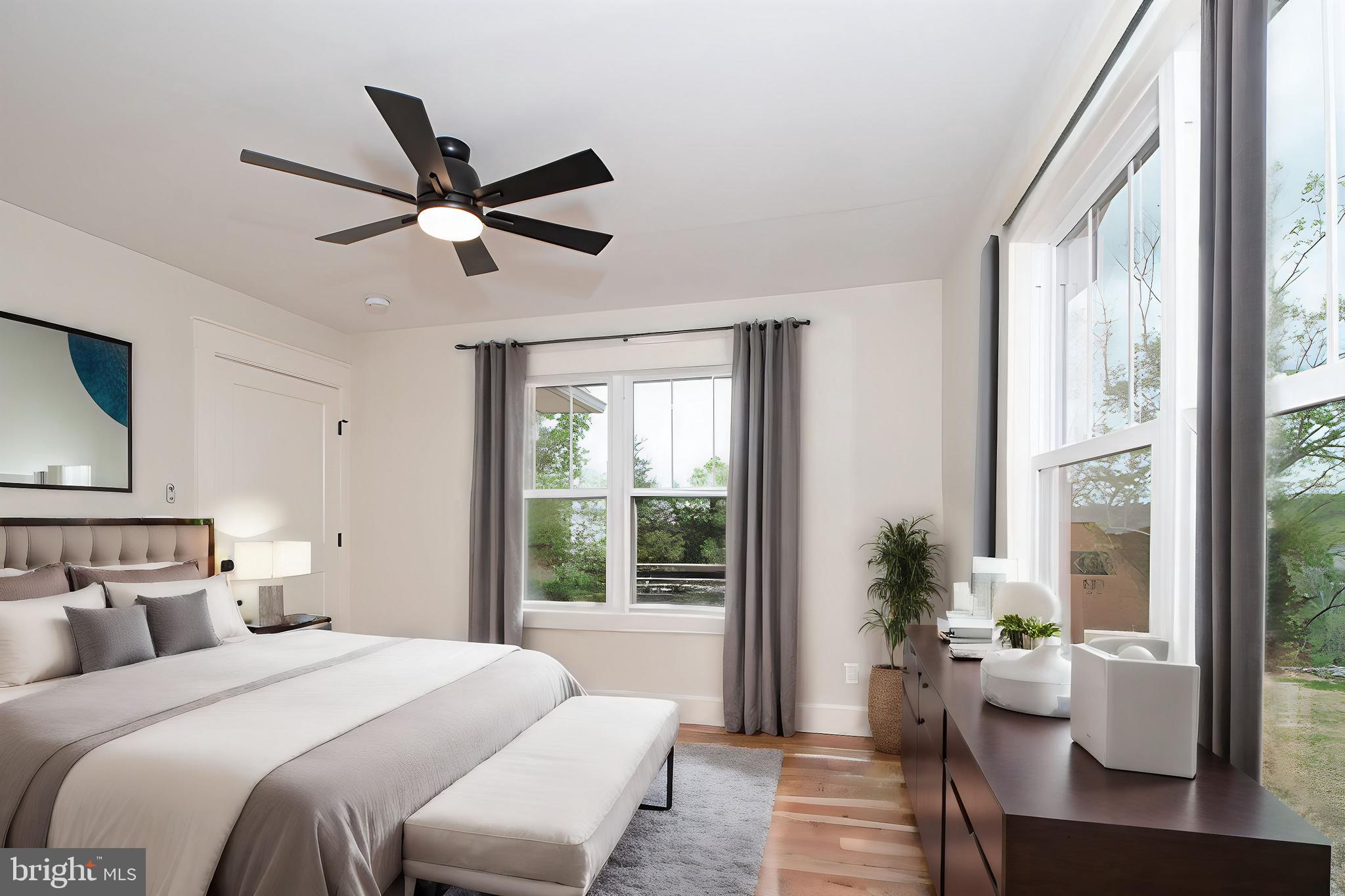 742 Joans Quadrangle Road Front Royal, VA 22630 - Photo 10 of 22 a bedroom with a large bed and a window