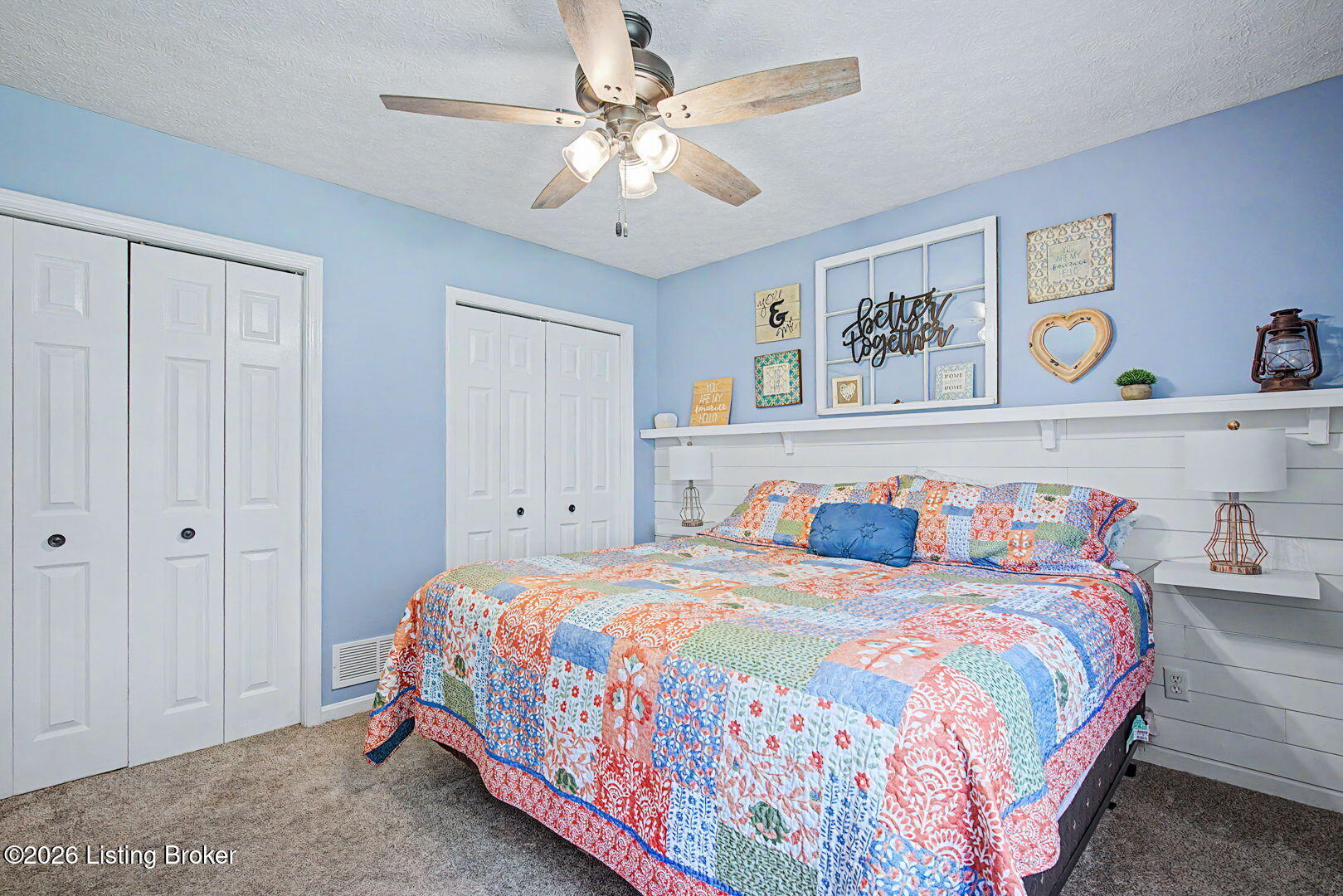 8121 Damascus Road Louisville, KY 40228 - Photo 18 of 49 Double closets and stylish shiplap on one wall.
