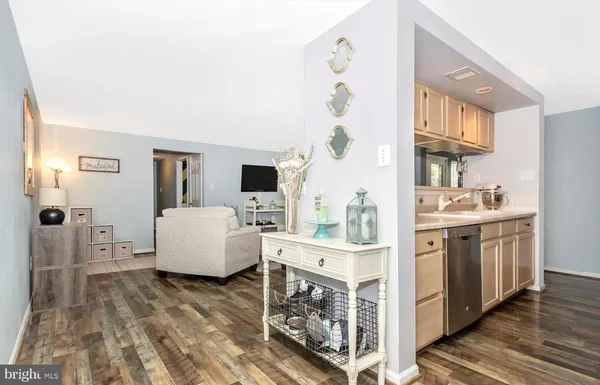 a living room with furniture and large window