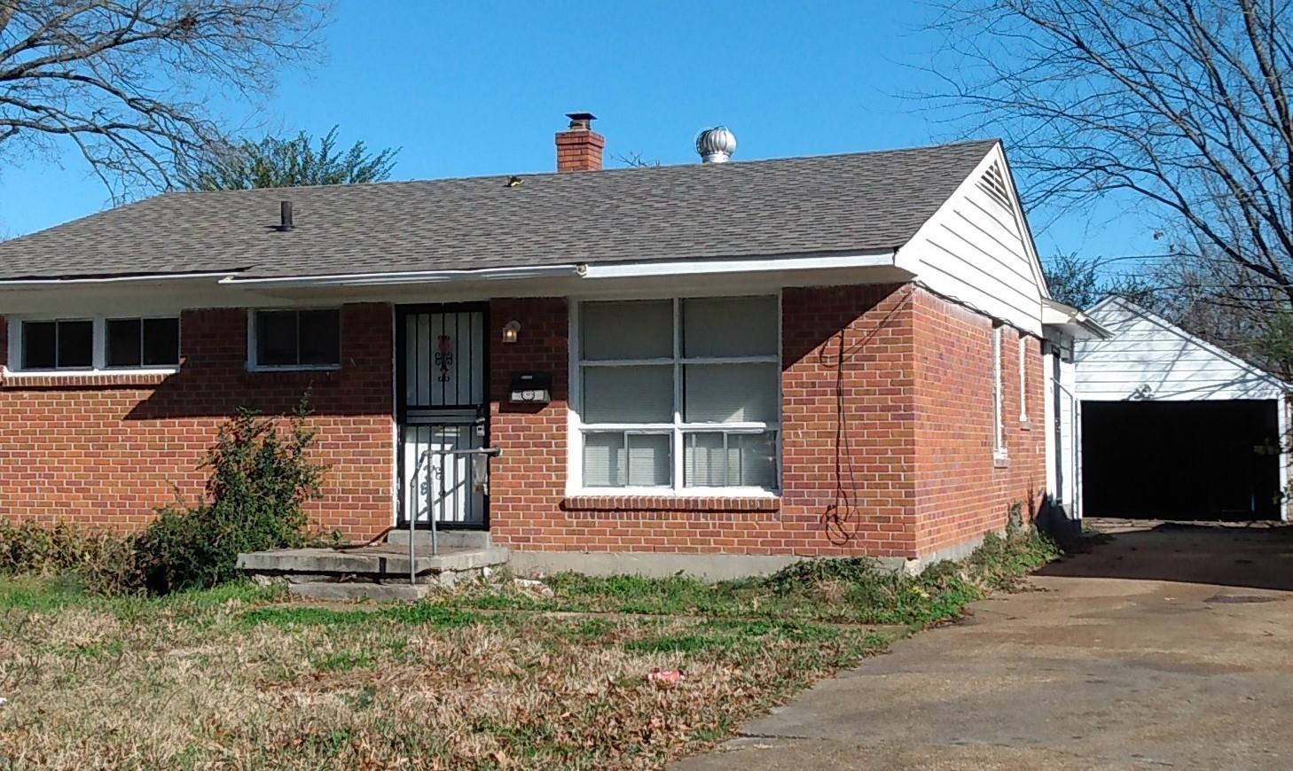 1662 Duke Road Memphis, TN 38108 - Photo 1 of 1 a view of a house with a yard