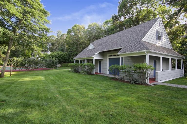 190 Conners Road Centerville, MA 02632 - Photo 13 of 27 a view of a house with a yard and potted plants