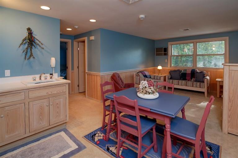 190 Conners Road Centerville, MA 02632 - Photo 15 of 27 a view of a dining room with furniture window and outside view