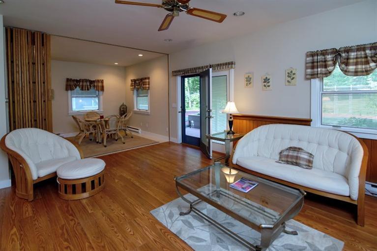 190 Conners Road Centerville, MA 02632 - Photo 19 of 27 a living room with furniture and a table