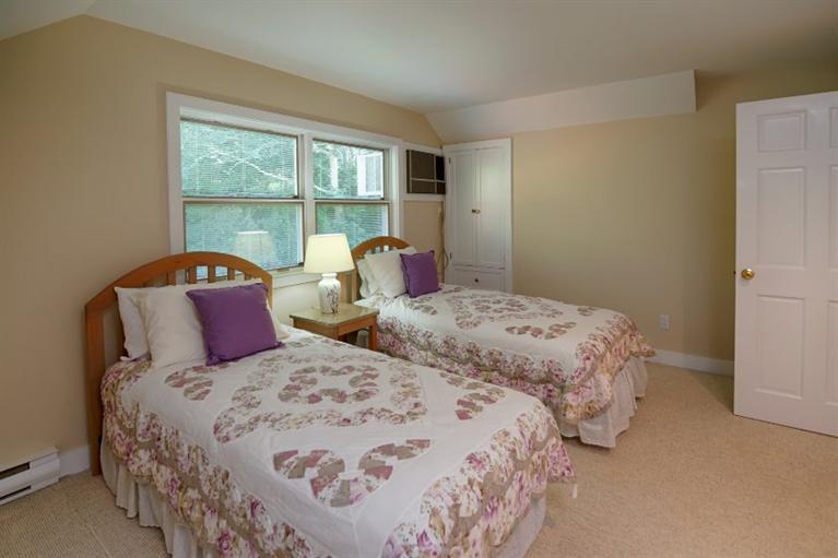 190 Conners Road Centerville, MA 02632 - Photo 20 of 27 a bedroom with two beds and a window
