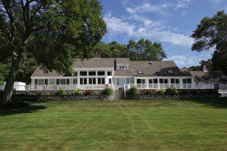 190 Conners Road Centerville, MA 02632 - Photo 3 of 27 a front view of a house with a garden