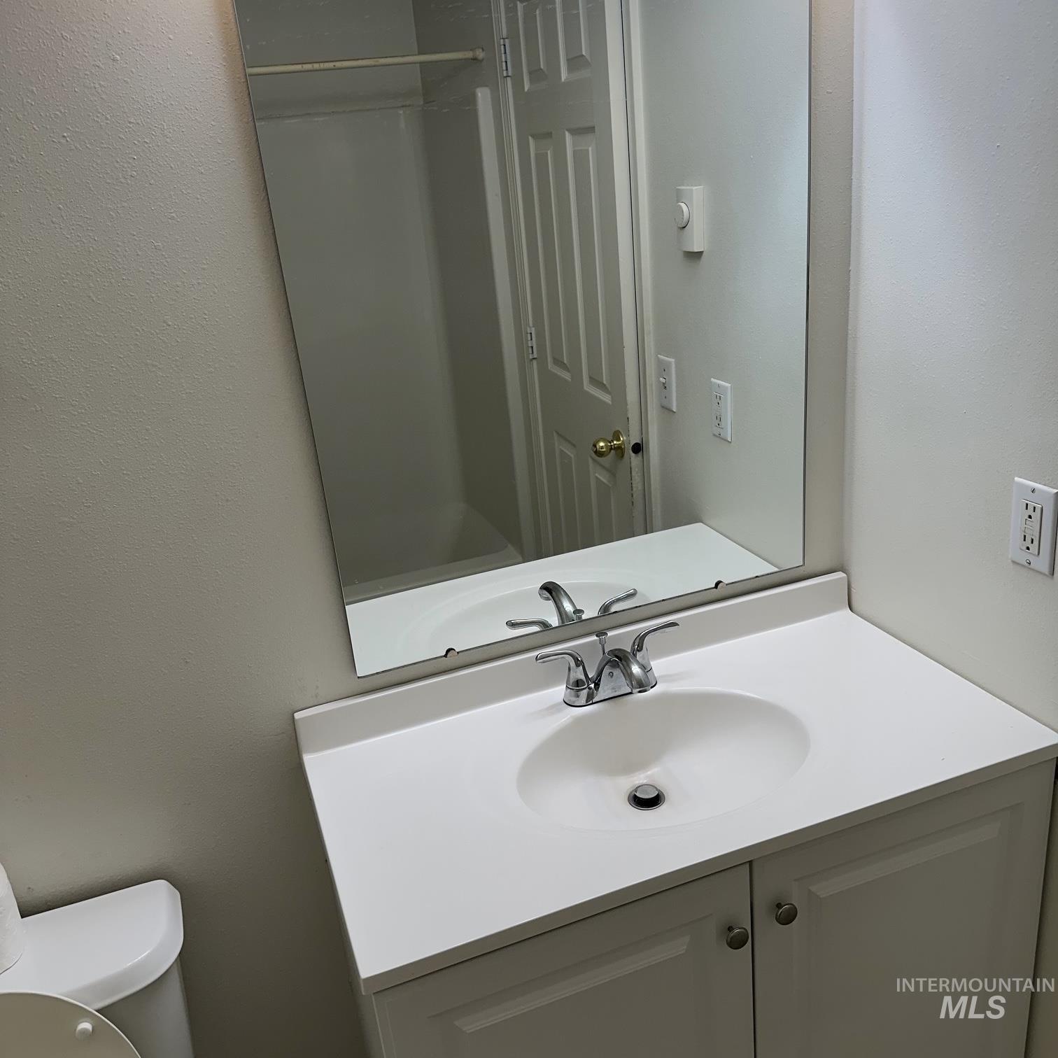 2140 Elizabeth Boulevard Twin Falls, ID 83301 - Photo 5 of 18 Bathroom with vanity and a textured wall