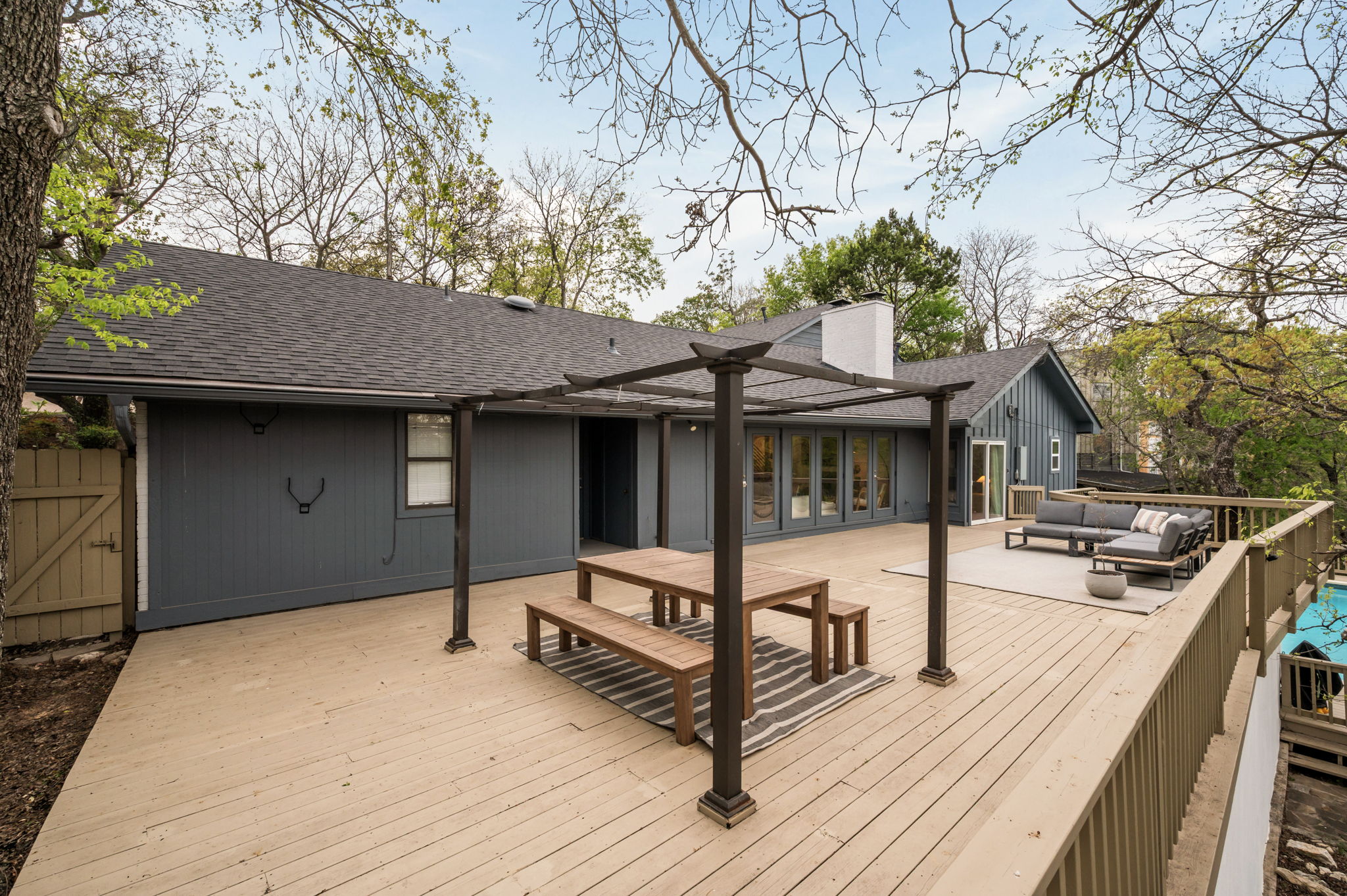 6501 Sumac Drive Austin, TX 78731 - Photo 27 of 40 Wooden terrace with an outdoor hangout area