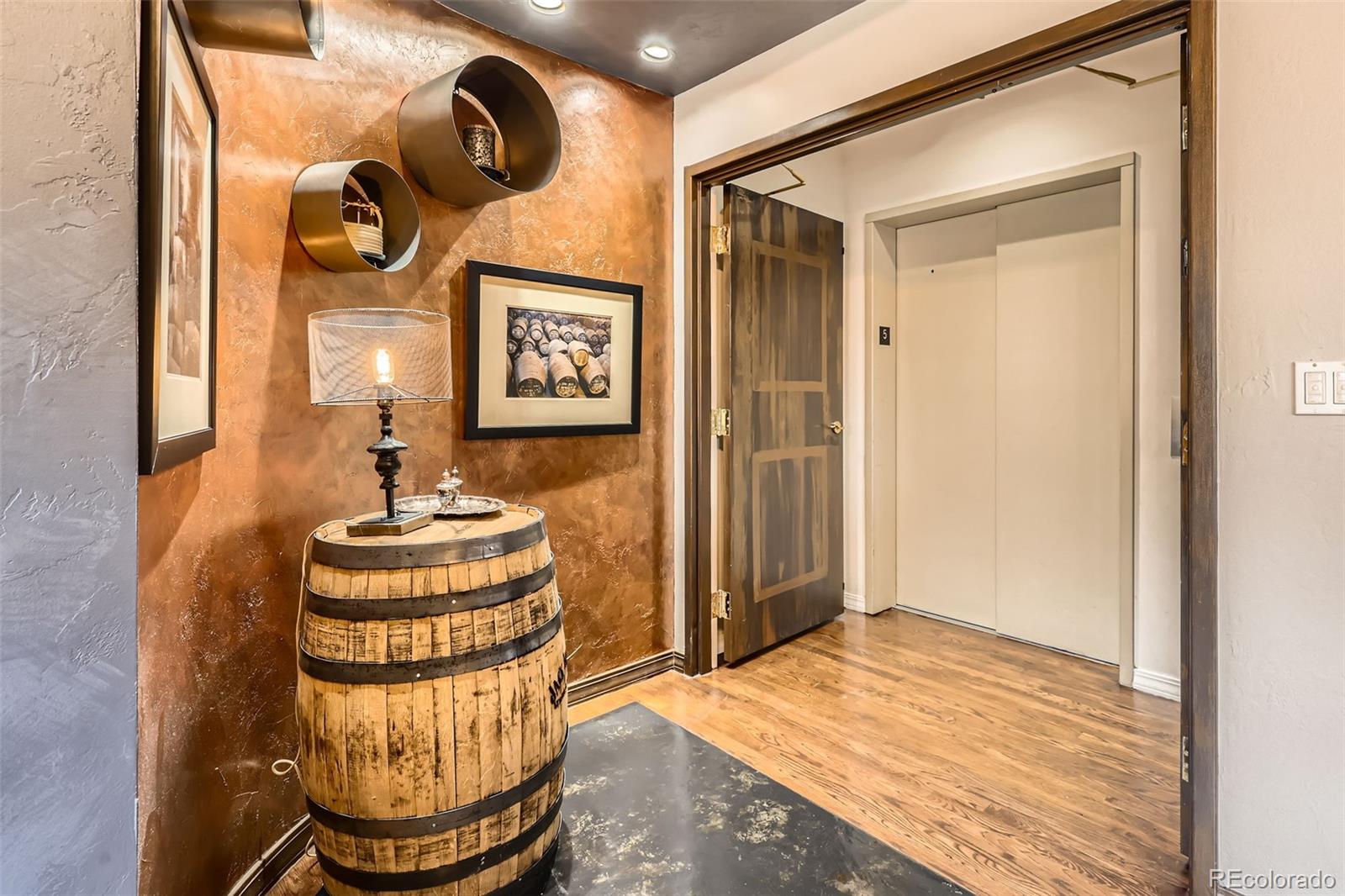 1735 19th Street, Unit 5B Denver, CO 80202 - Photo 2 of 50 a bathroom with a sink and a mirror