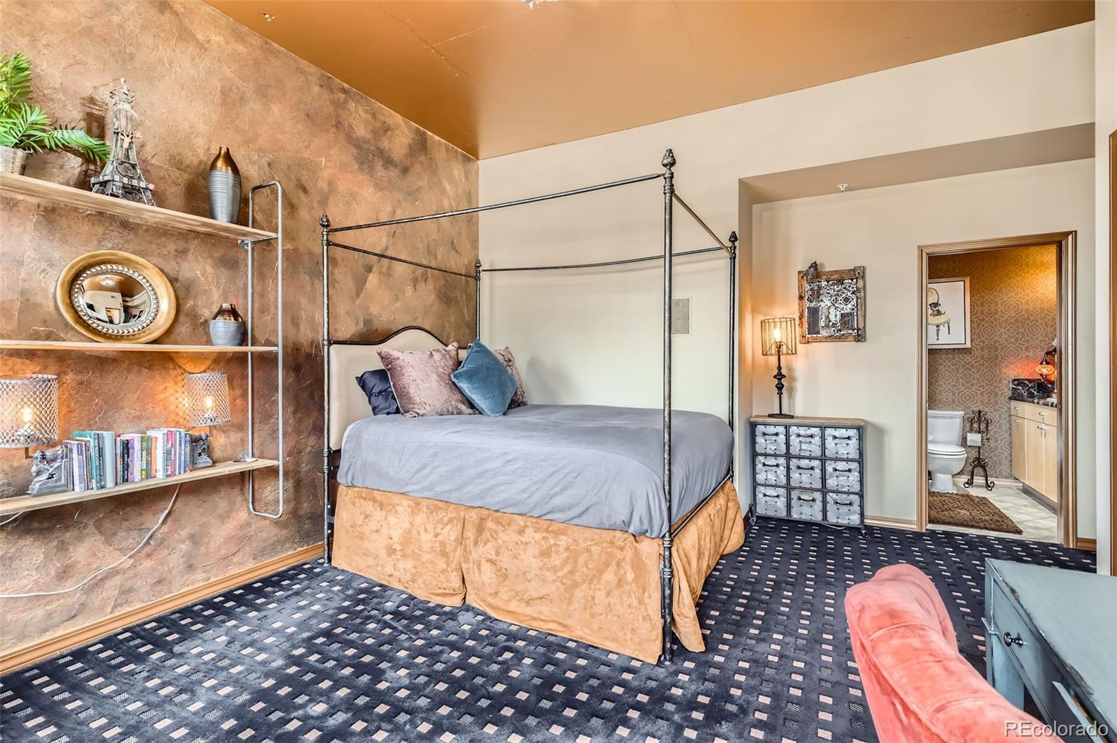 1735 19th Street, Unit 5B Denver, CO 80202 - Photo 27 of 50 a bedroom with a bed and wooden floor