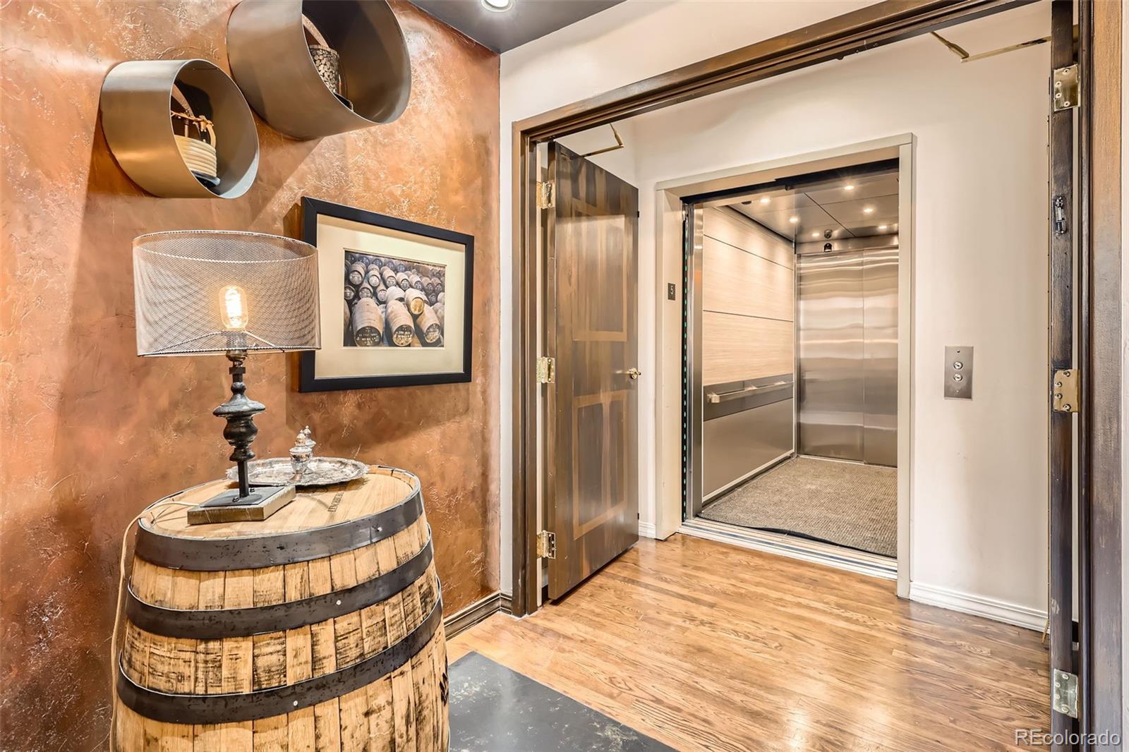 1735 19th Street, Unit 5B Denver, CO 80202 - Photo 3 of 50 a bathroom with a sink and a mirror
