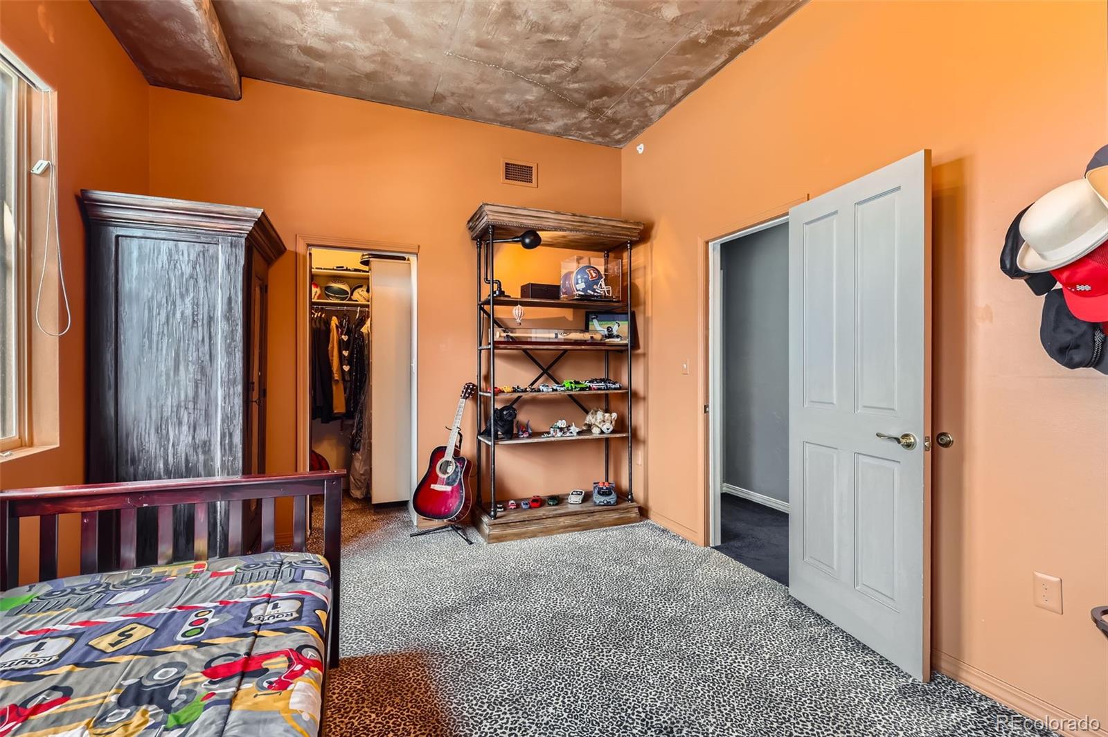 1735 19th Street, Unit 5B Denver, CO 80202 - Photo 32 of 50 a children room with a bed and a window