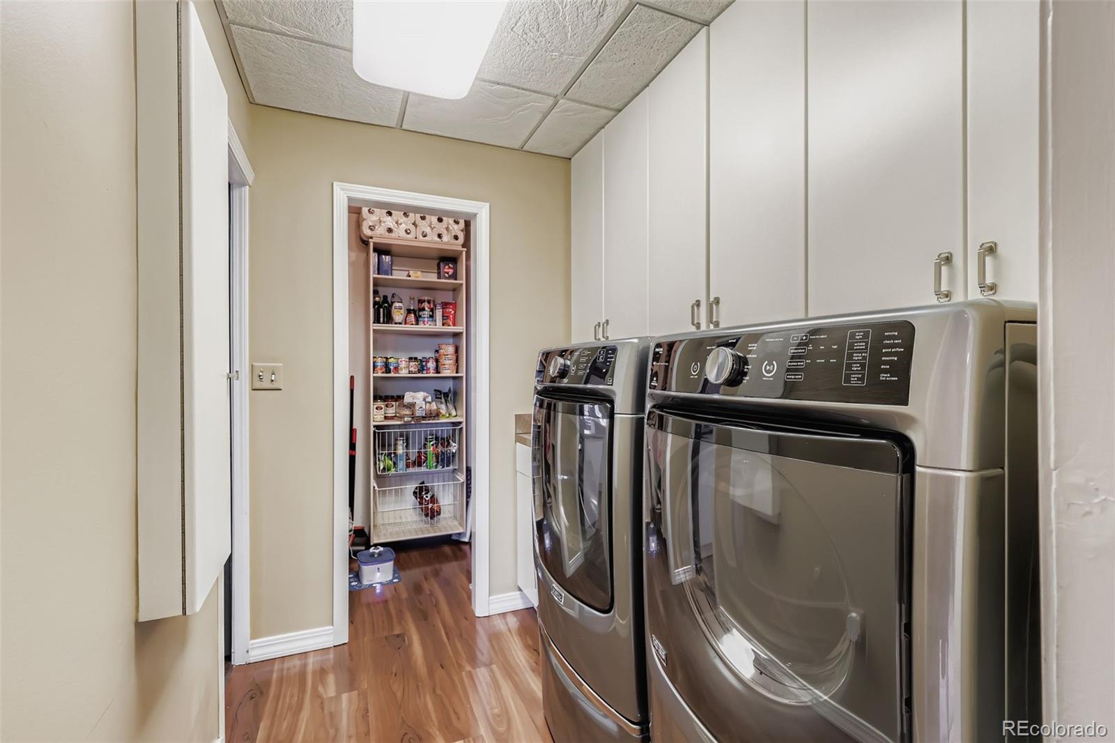 1735 19th Street, Unit 5B Denver, CO 80202 - Photo 36 of 50 a view of walk in closet with clothes and shoes