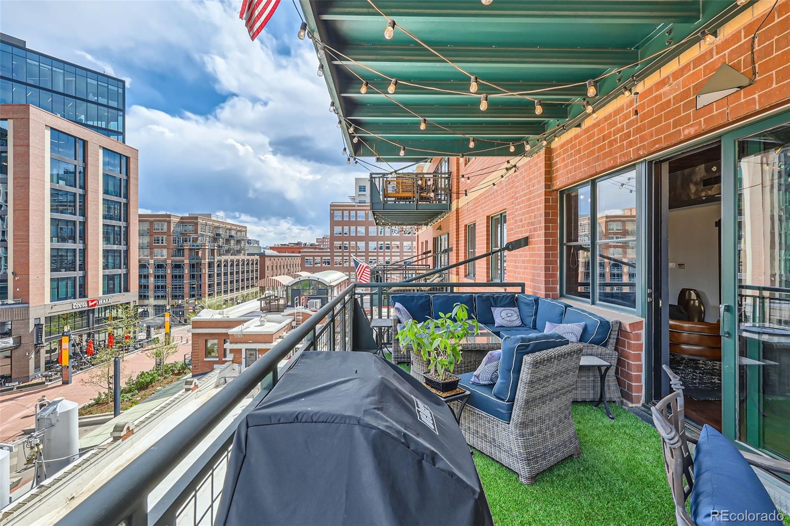 1735 19th Street, Unit 5B Denver, CO 80202 - Photo 39 of 50 a view of a balcony with chairs