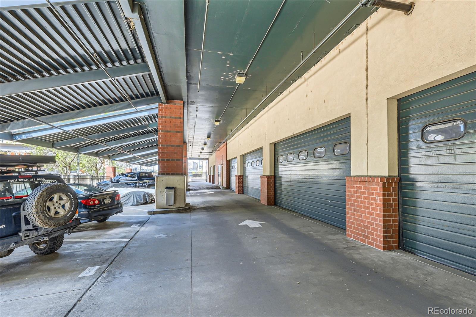 1735 19th Street, Unit 5B Denver, CO 80202 - Photo 47 of 50 a view of a garage with side of a road