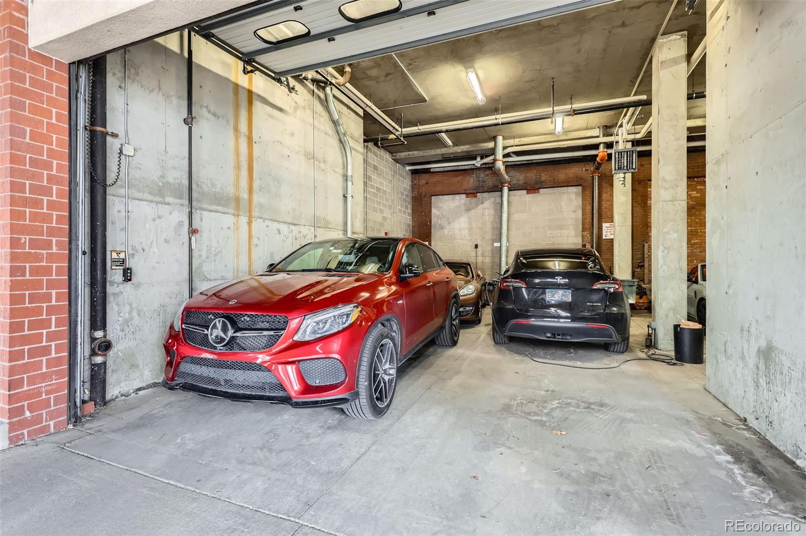 1735 19th Street, Unit 5B Denver, CO 80202 - Photo 48 of 50 a bedroom with a bed and window