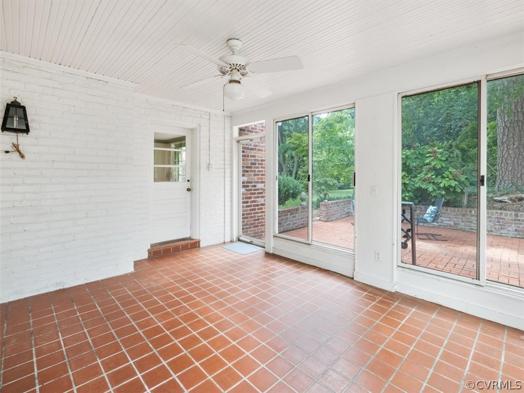 208 Ross Road Henrico, VA 23229 - Photo 11 of 31 a view of an empty room with wooden floor and a window