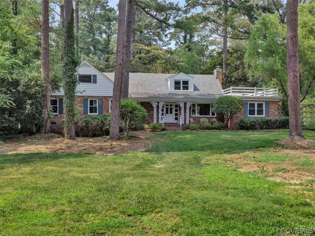 208 Ross Road Henrico, VA 23229 - Photo 2 of 31 a front view of a house with a yard