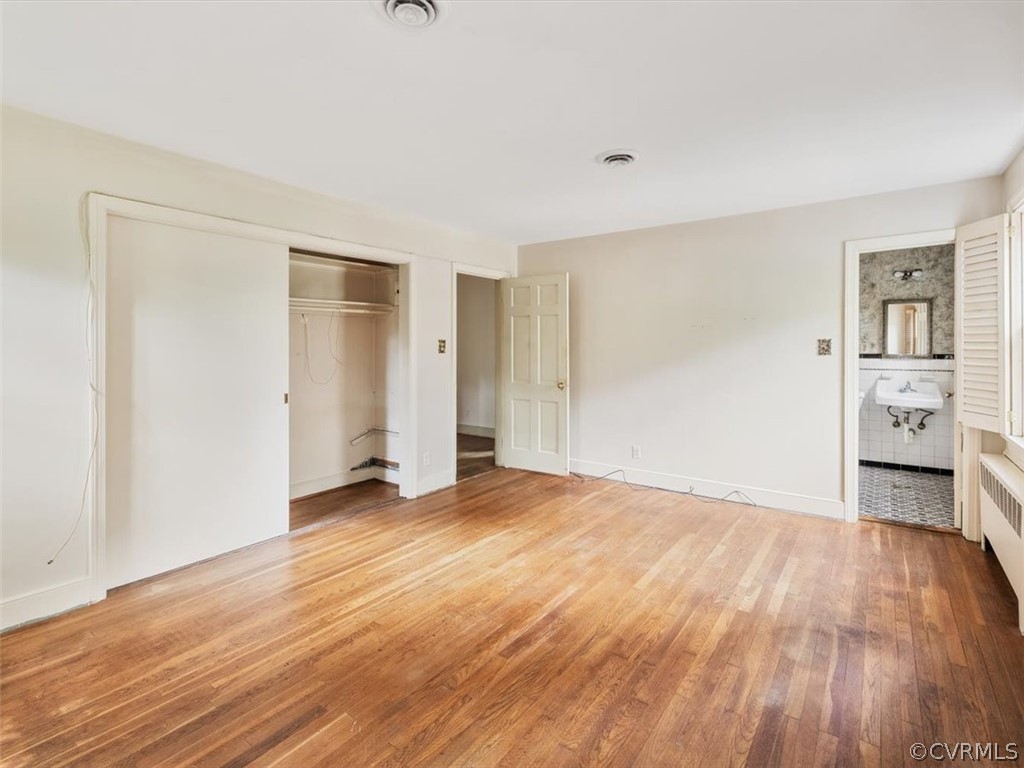 208 Ross Road Henrico, VA 23229 - Photo 22 of 31 a view of empty room with wooden floor and window