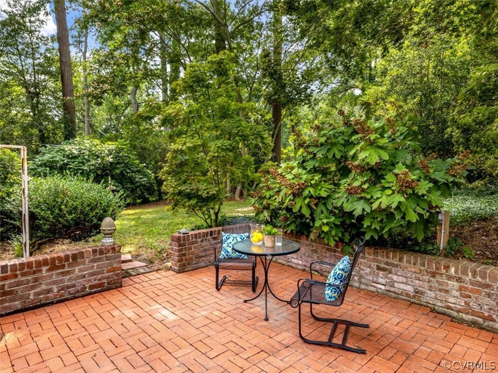208 Ross Road Henrico, VA 23229 - Photo 26 of 31 a backyard of a house with yard and outdoor seating
