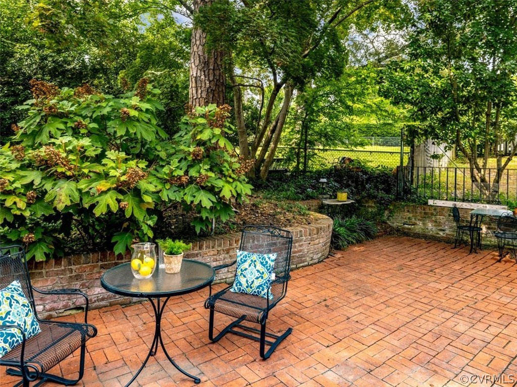 208 Ross Road Henrico, VA 23229 - Photo 27 of 31 a view of a chairs and table in the patio