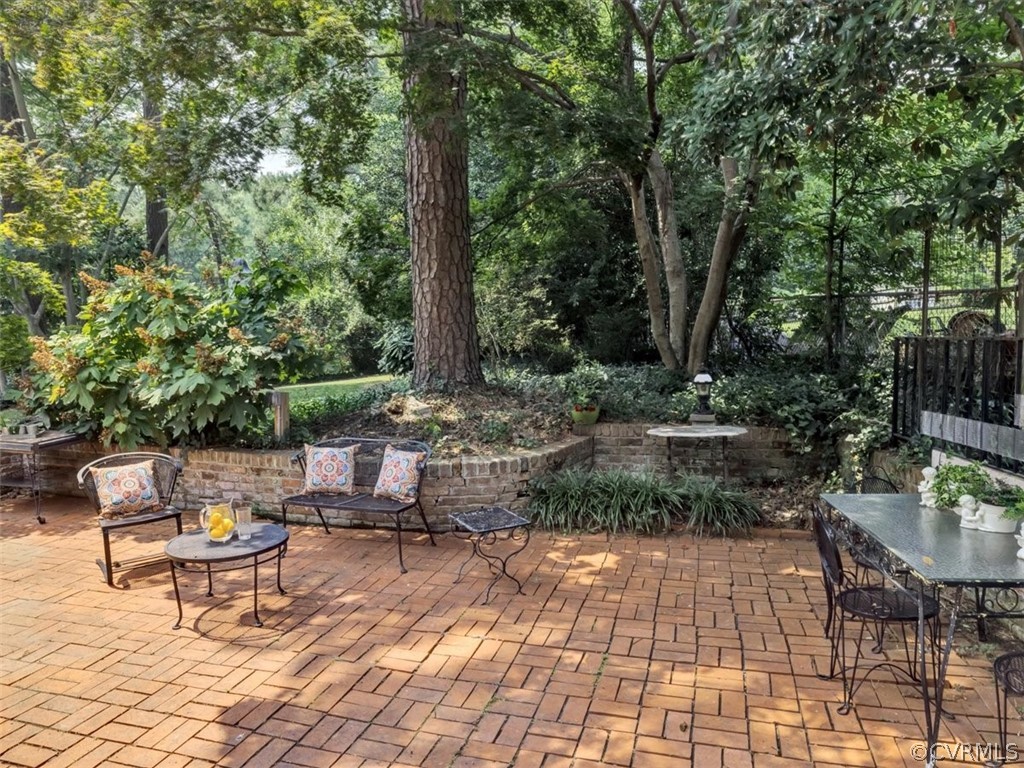 208 Ross Road Henrico, VA 23229 - Photo 28 of 31 a view of a backyard with sitting area
