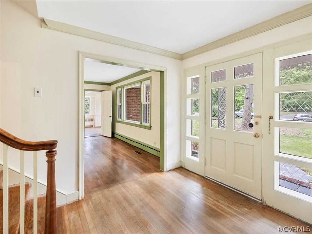 208 Ross Road Henrico, VA 23229 - Photo 5 of 31 wooden floor in an empty room with a window