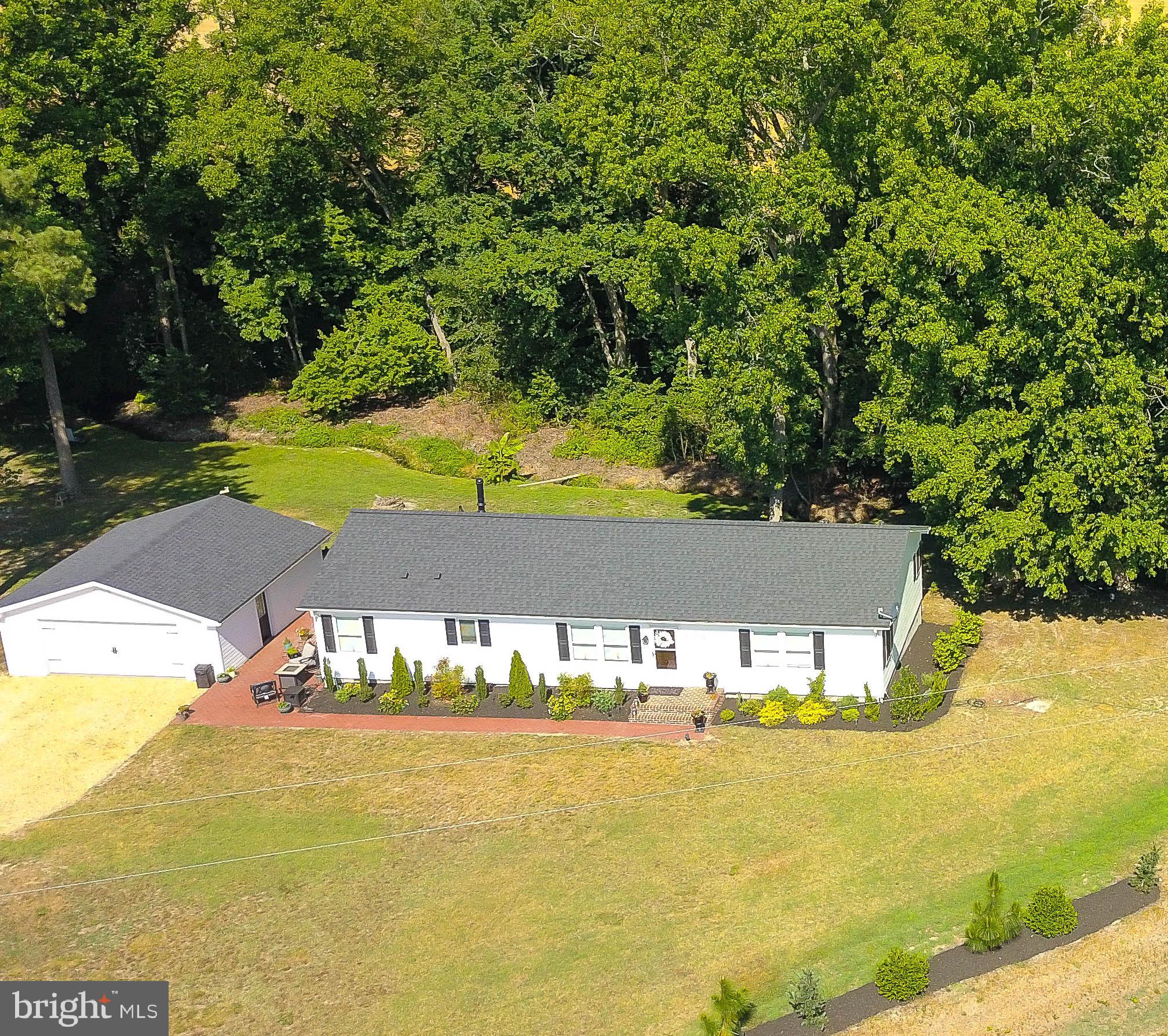 5520 Indiantown Road Rhodesdale, MD 21659 - Photo 2 of 51 a view of a swimming pool with an outdoor space