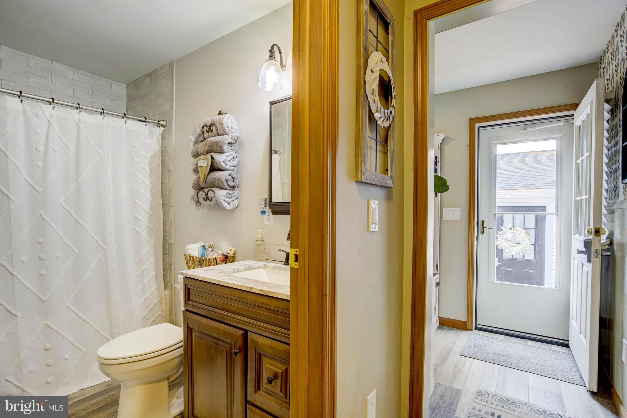 5520 Indiantown Road Rhodesdale, MD 21659 - Photo 22 of 51 a bathroom with a sink toilet and shower