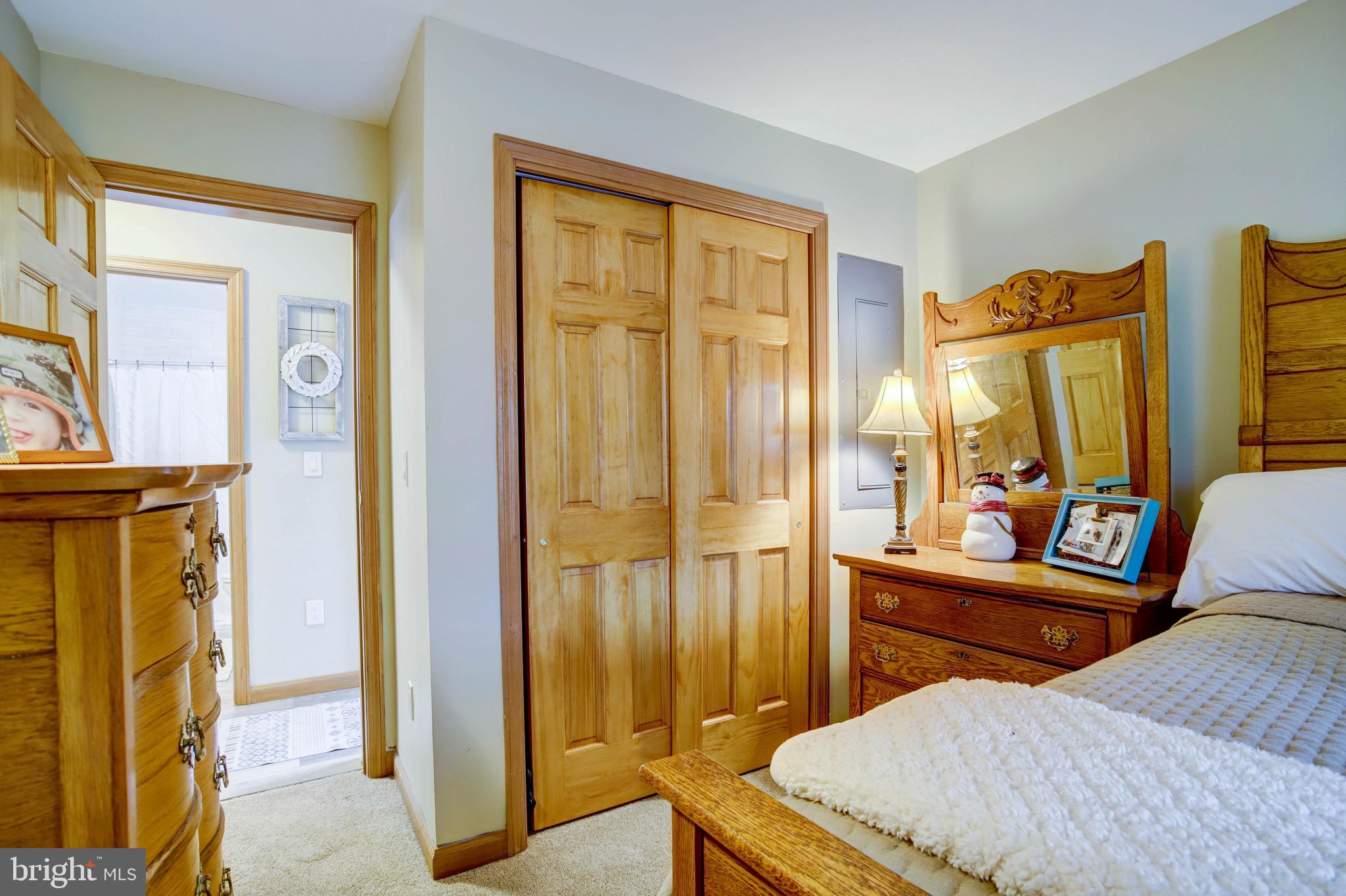 5520 Indiantown Road Rhodesdale, MD 21659 - Photo 25 of 51 a bedroom with a bed and wooden floor